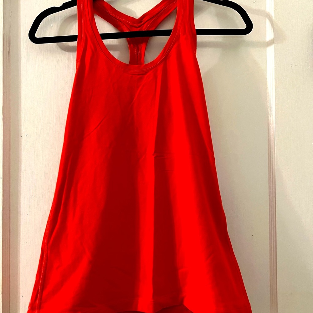 Bright Pink Lululemon Racerback Tank size 8
Very good condition 
Form fitting